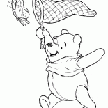 ウィニーは蝶をキャッチ